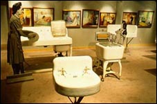 Original artwork from early product advertisements enhance the displays of product they promoted.